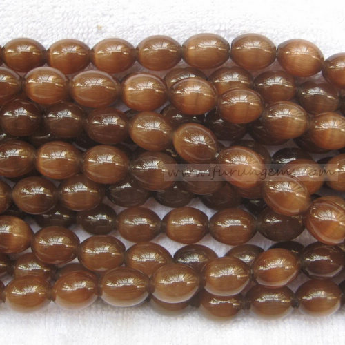 cat eye brown rice beads 11x14mm 2mm hole