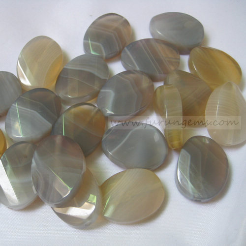 bostwana agate oval irregular shape faceted